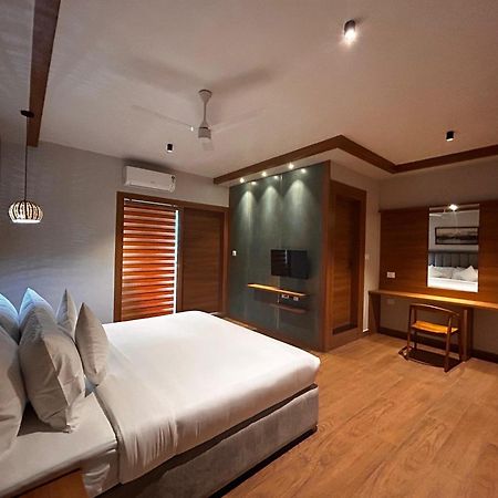 Hotel Cmk Habitat Centre à Kochi Extérieur photo
