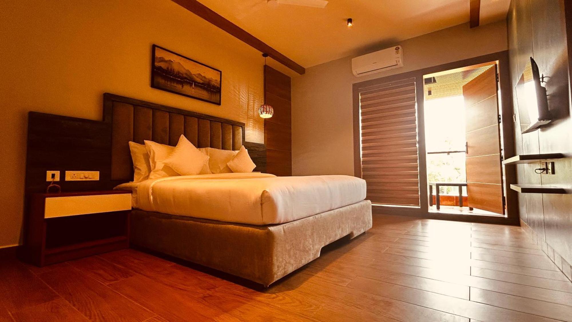 Hotel Cmk Habitat Centre à Kochi Extérieur photo
